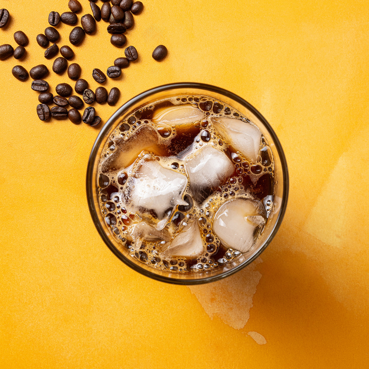 Iced Wana'ao 100% Kona coffee with roasted beans